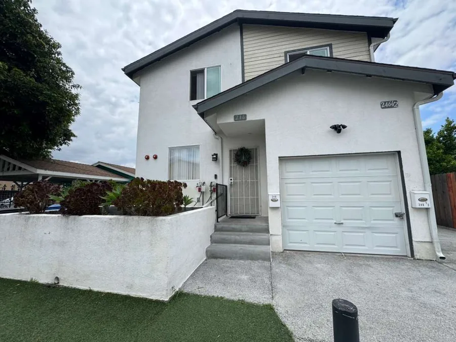 Front of the Wellness Housing women's house on East 69th Street in Los Angeles