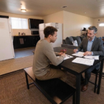 House manager explaining the intake process at a Wellness Housing sober living home in Los Angeles.