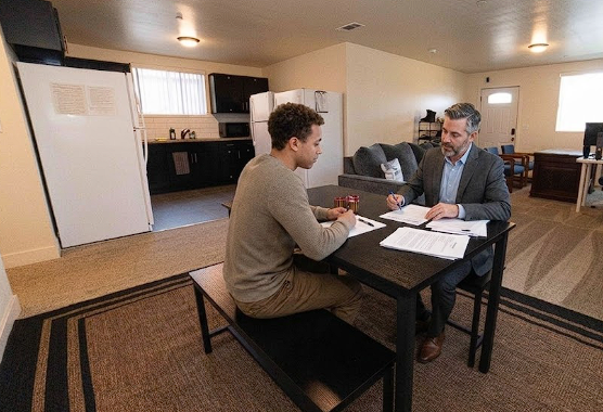 House manager explaining the intake process at a Wellness Housing sober living home in Los Angeles.
